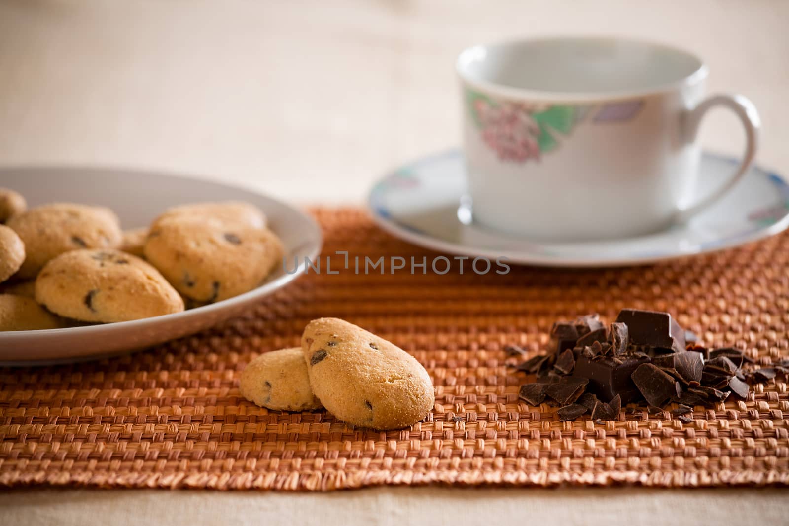 Cookies with chocolate chips on a tablecloth