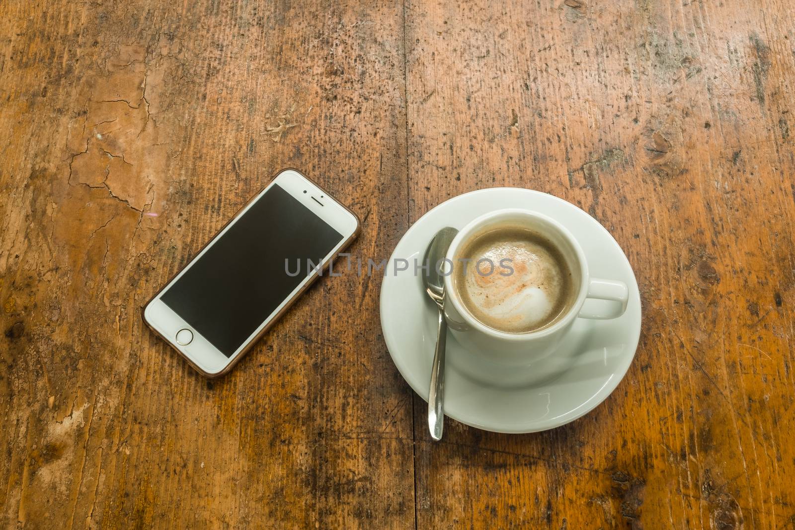 smartphone and coffee by verbano