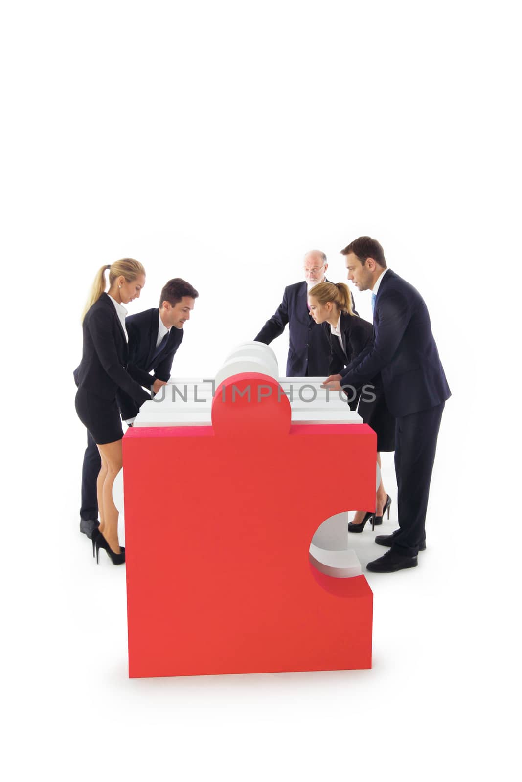 Business people team assembling puzzle isolated on white background