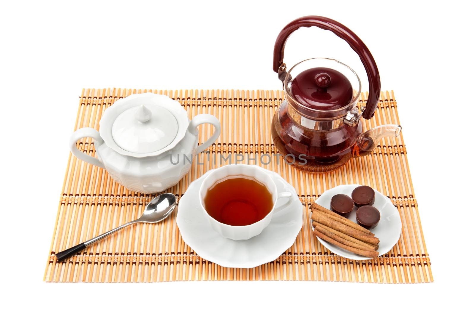 tea and tea utensils isolated on white background