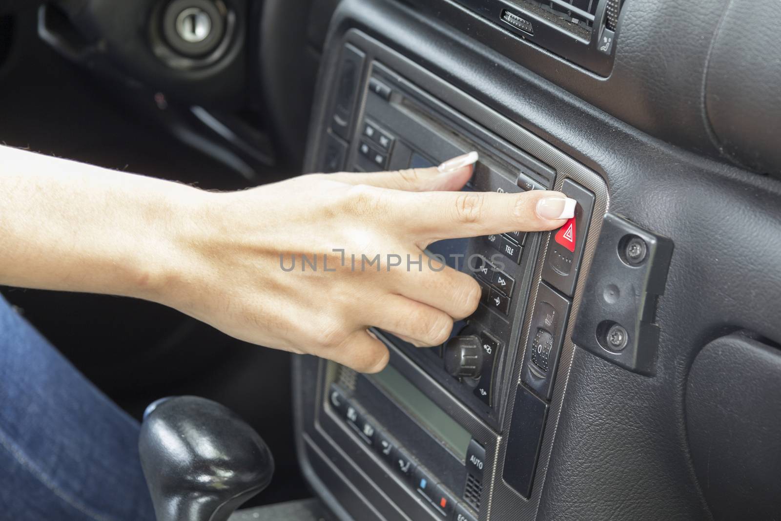 close-up of a girl's hand on the dashboard in a car
