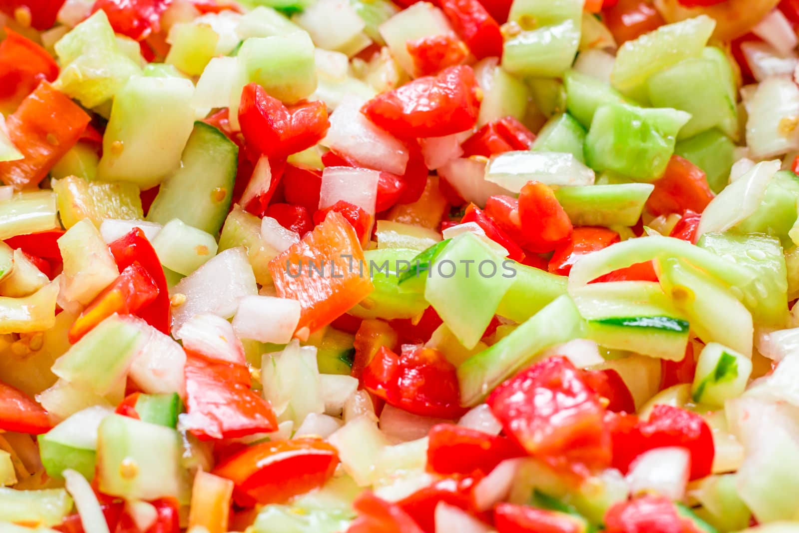 Vegetable salad mix of fresh sliced tomatoes, onions, peppers and cucumbers