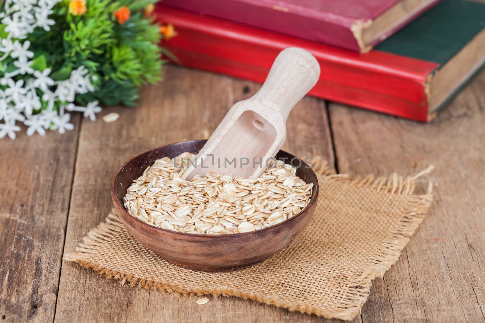 oats in plate on wood table by amnarj2006
