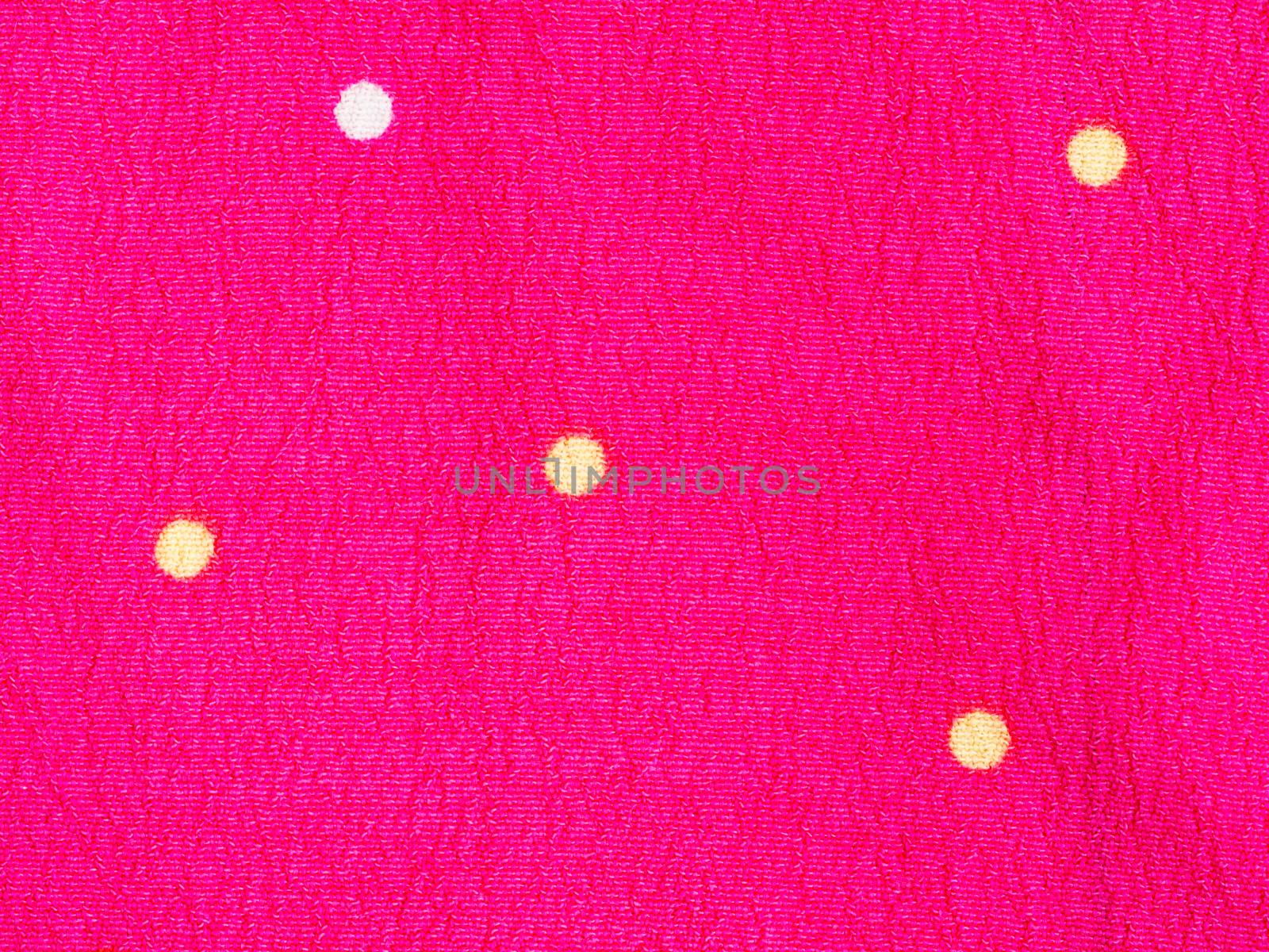 pink polka dot crepe textile background by fascinadora