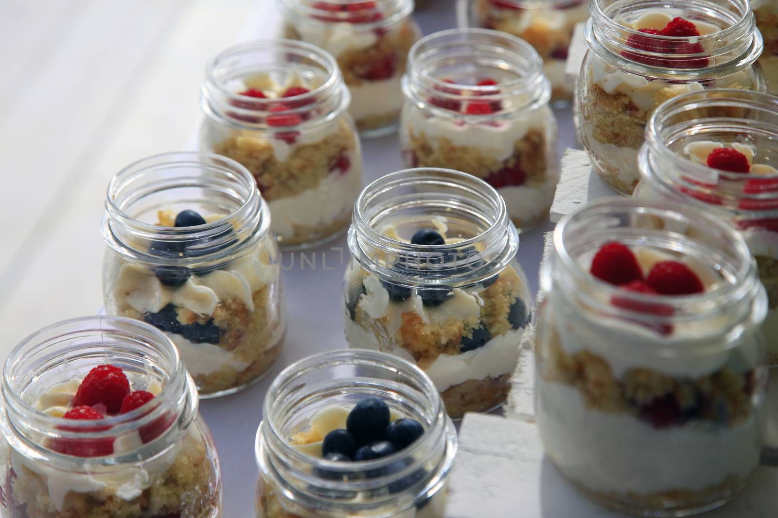 Dessert with fresh fruit in containers of glass
