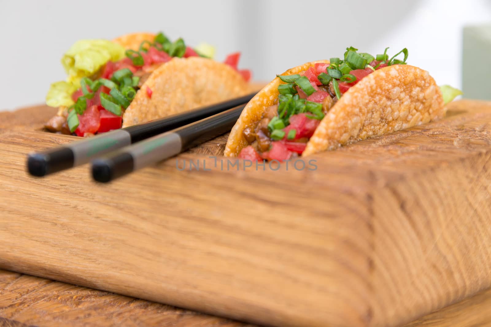fresh mexican taco shells with beef and vegetables by vlaru