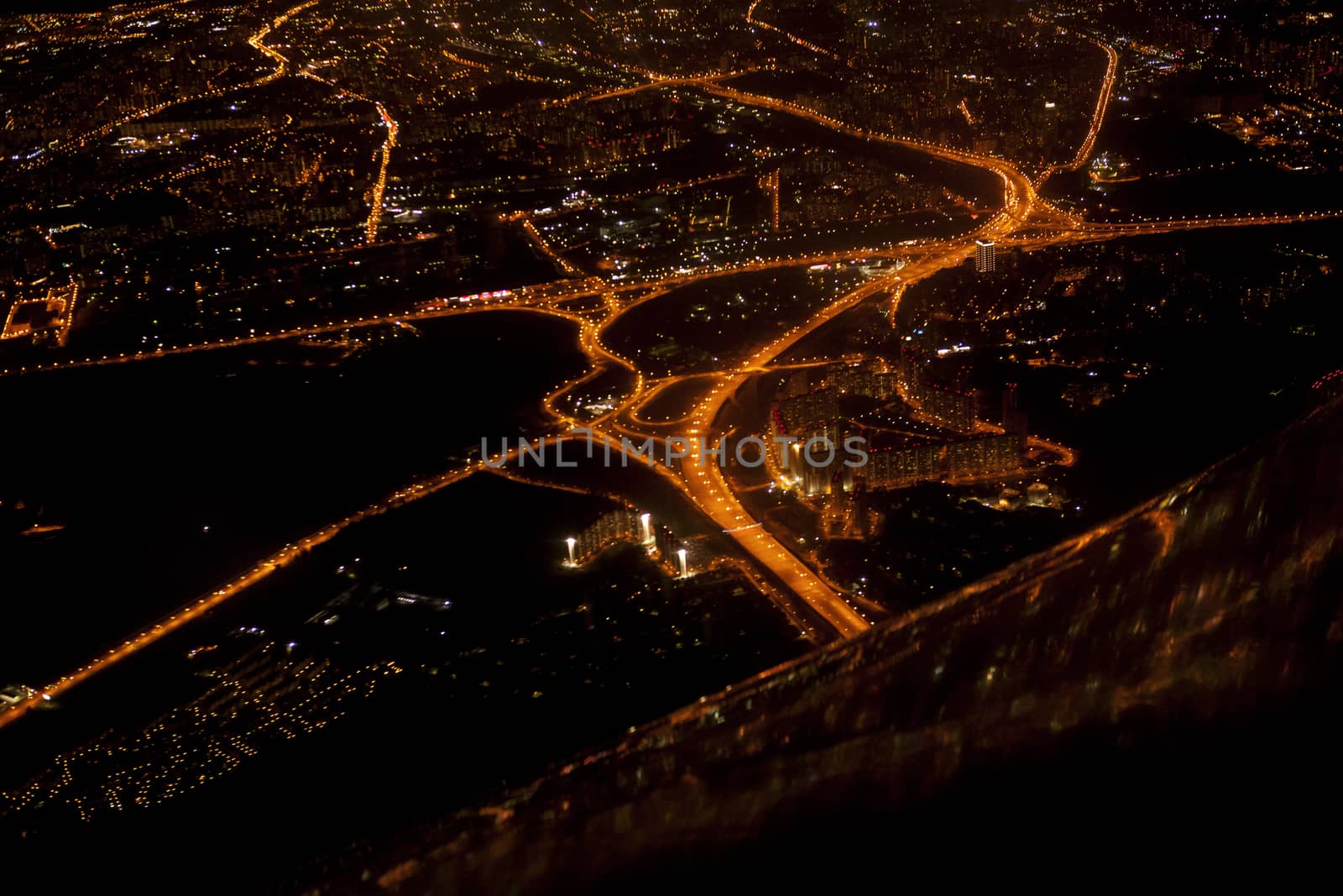 Night view of the city of Moscow from a flying airplane.