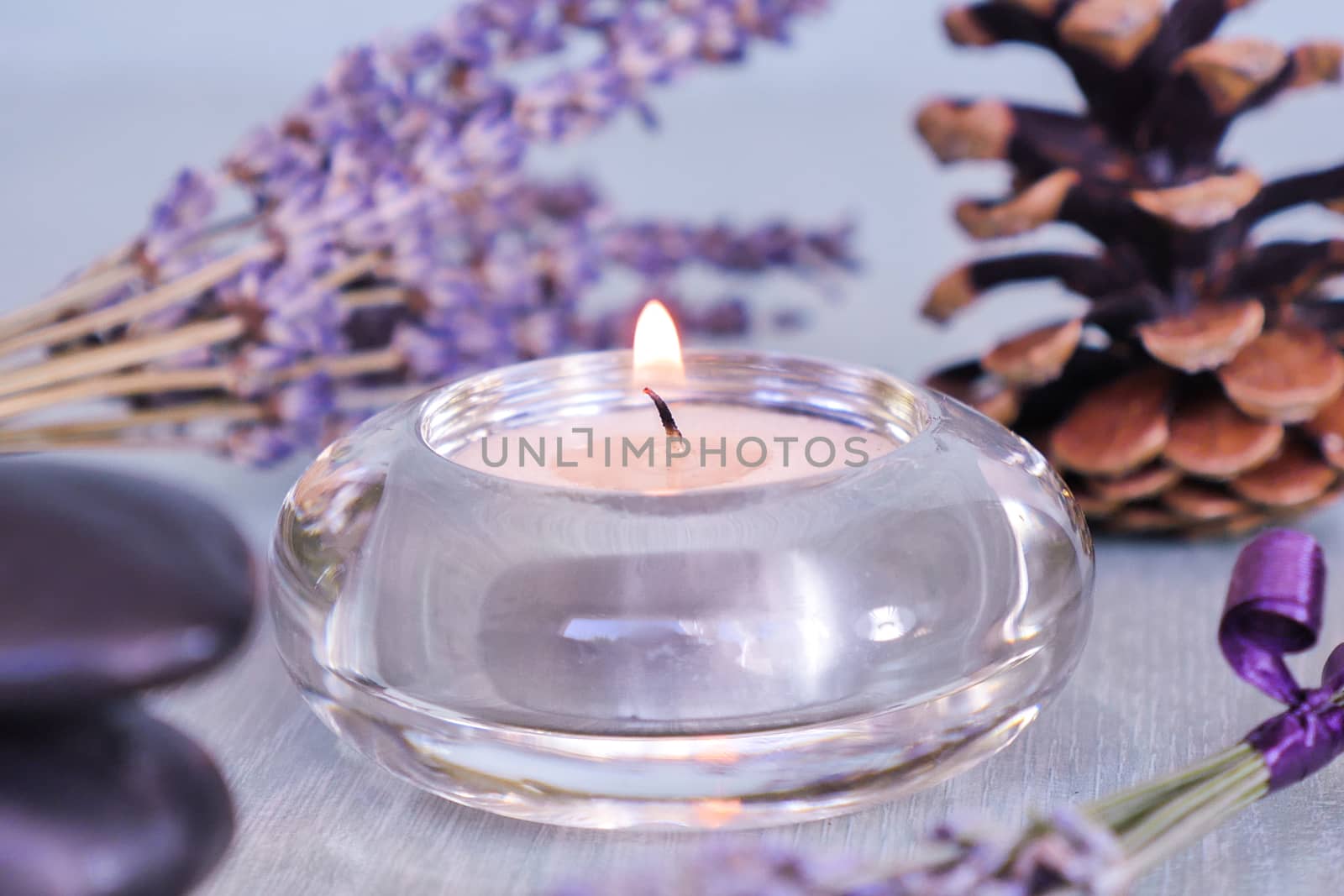 Candles with lavender flowers on table, France, Europe