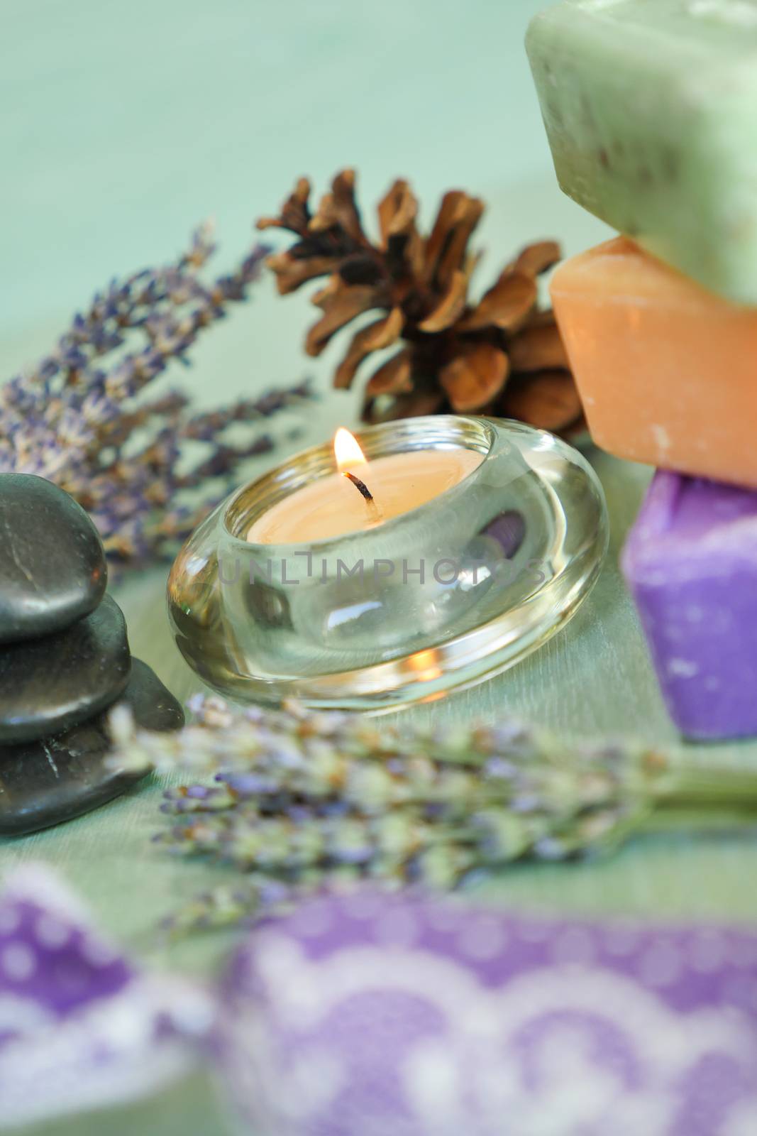 Candles with lavender flowers on table, France, Europe