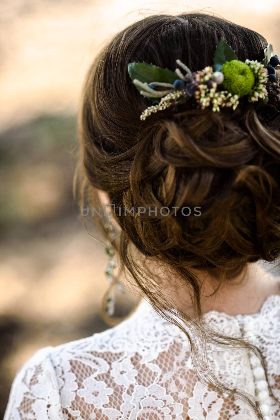 bride hair back, twisted twisted curls with flowers