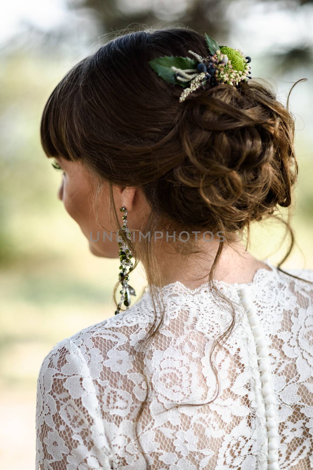 bride hair back, twisted twisted curls with flowers