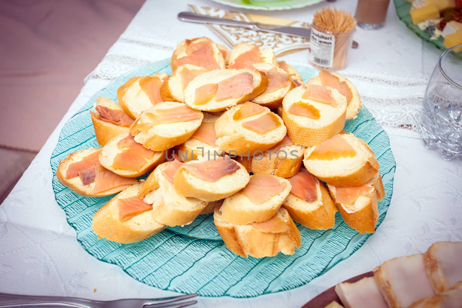 Cocktail food appetizer with salmon bruschetta breads