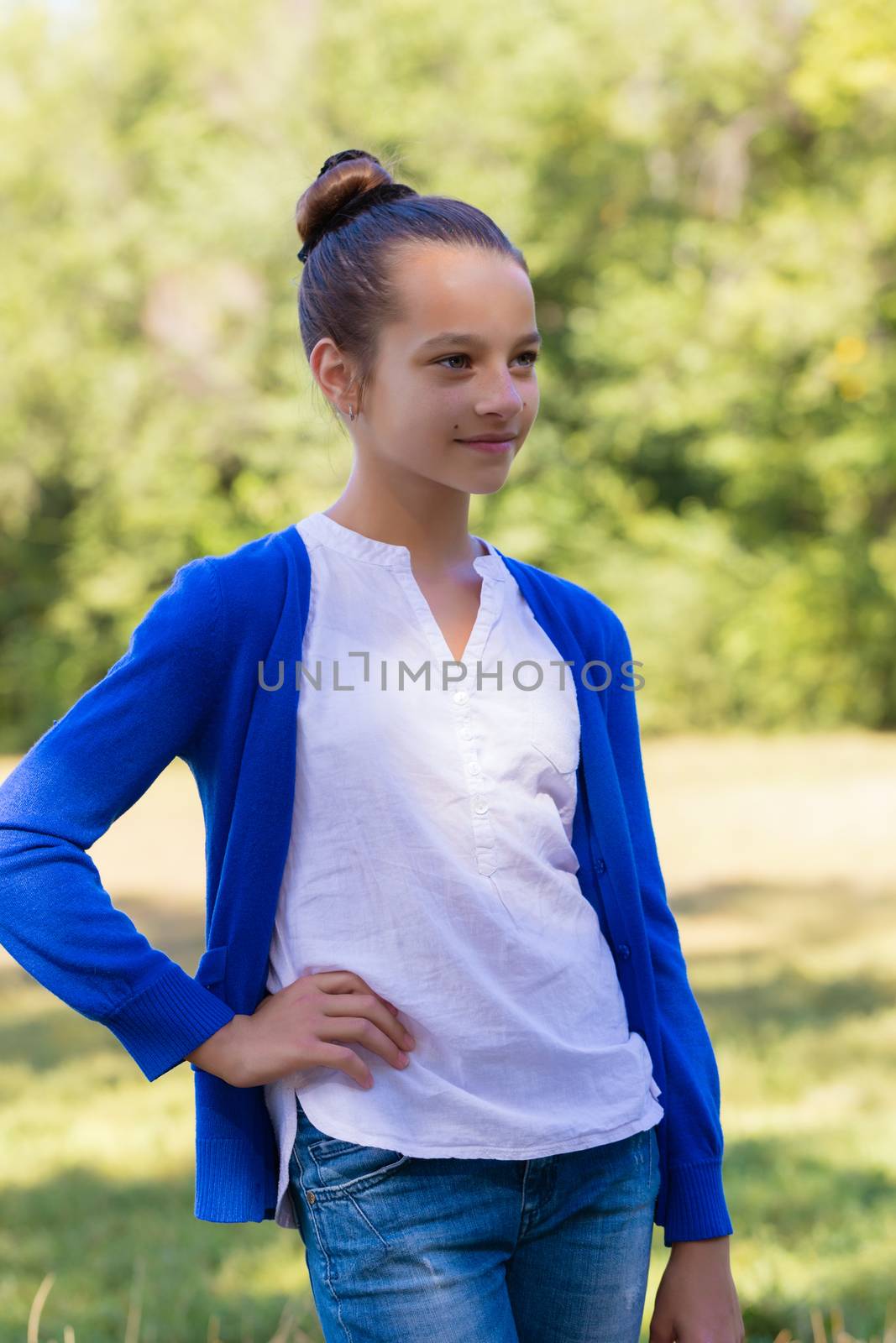 portrait of teen girl outdoors in the park