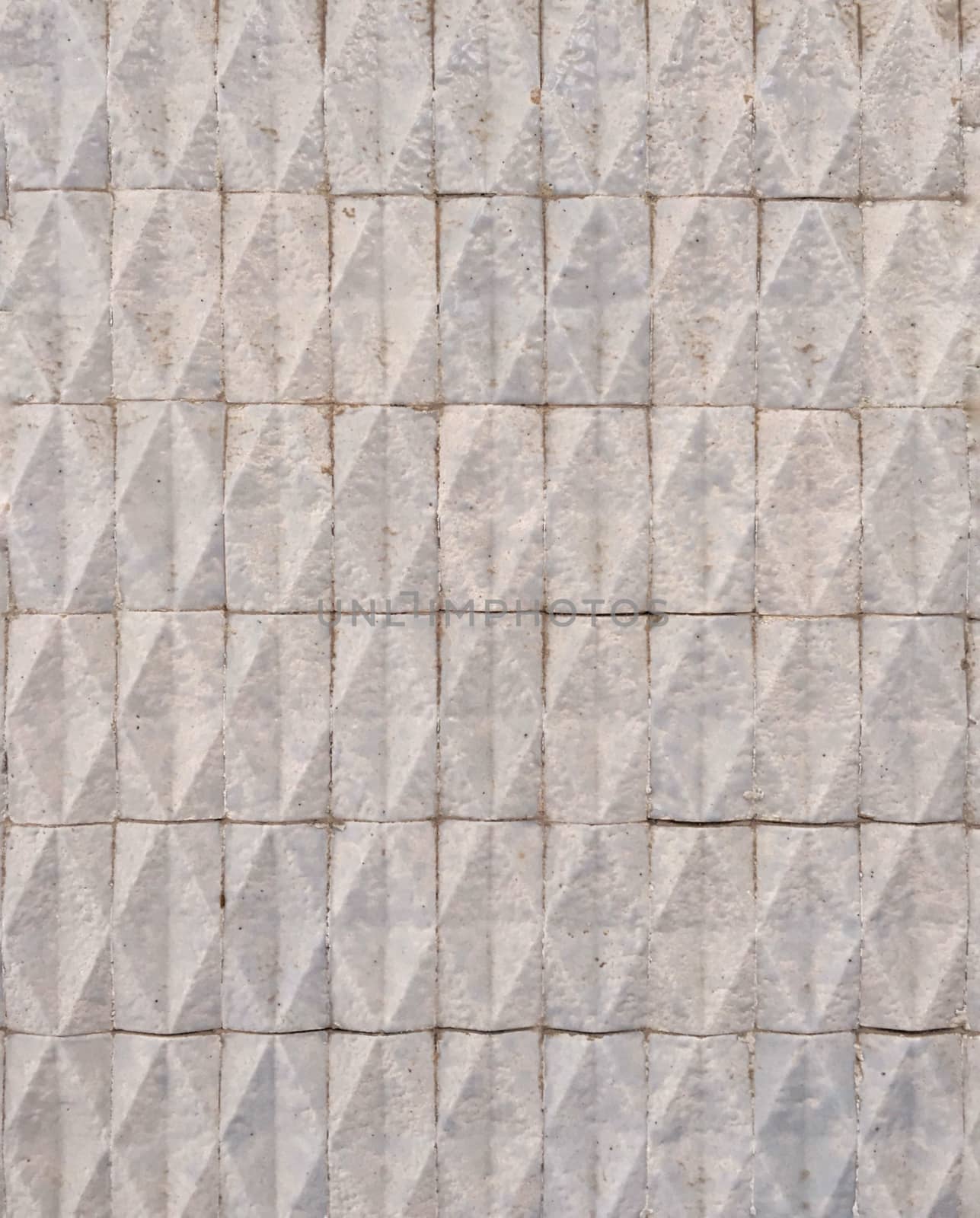 close up of a pattern made with rough tiles