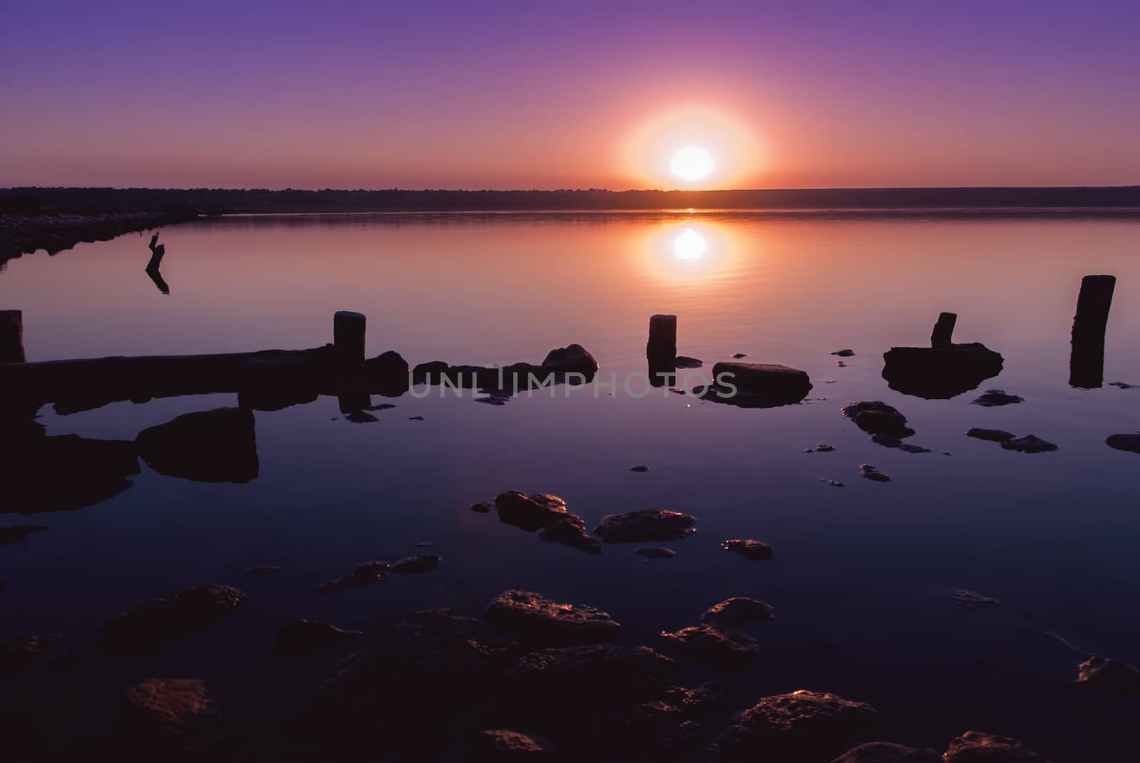 Landscape with sunset over lake by Zhukow