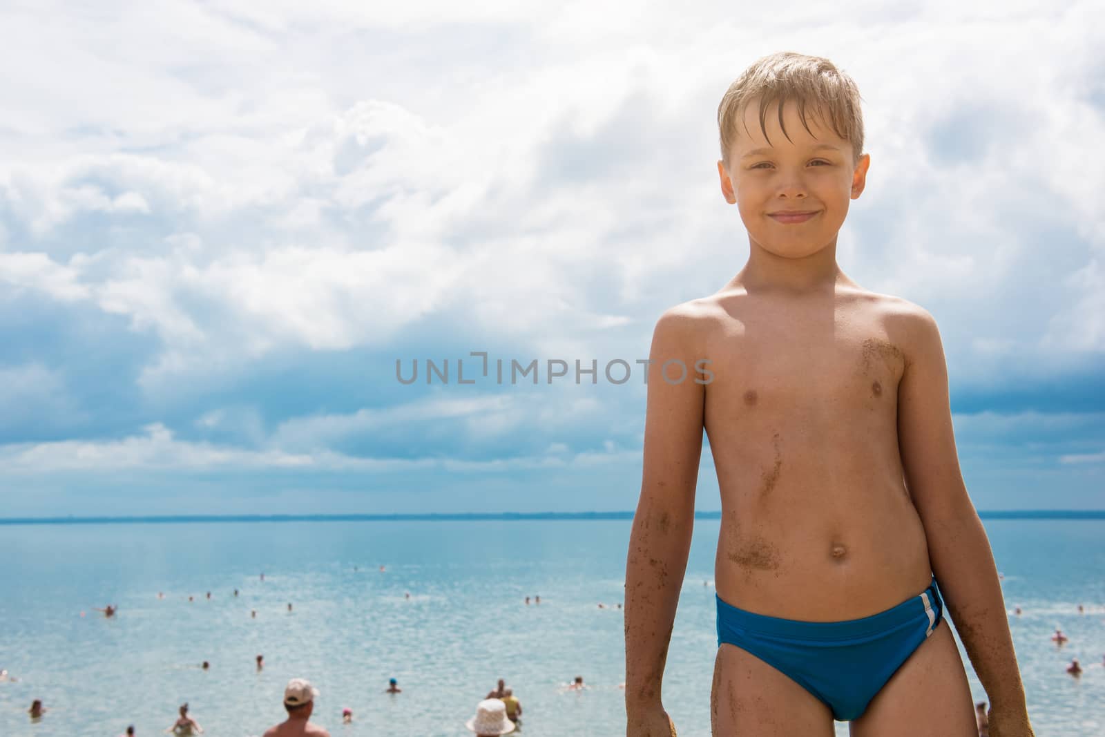 Baby boy at beach by rusak