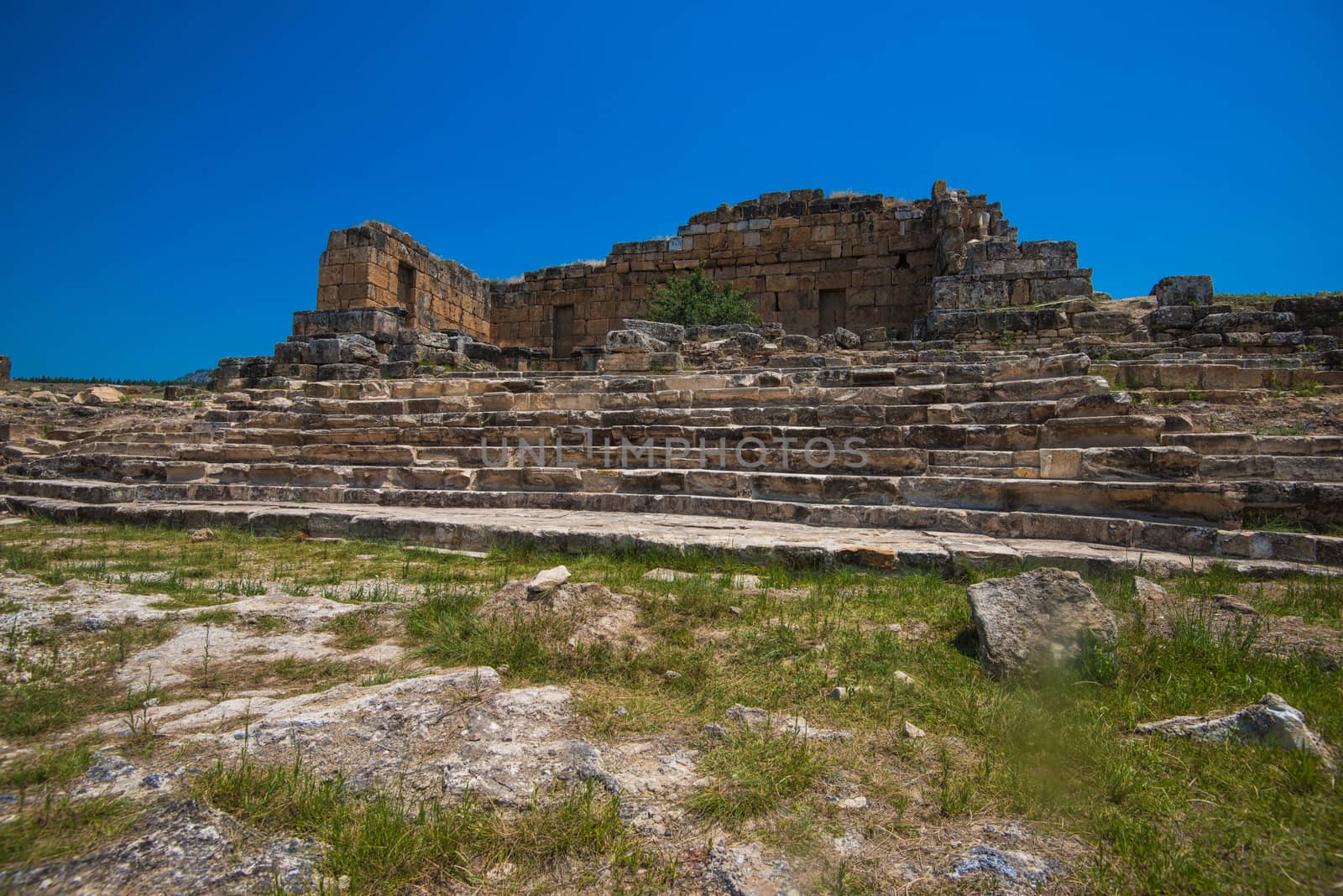 Pammukale, Turkey - July, 2015: photo of ancient city Hierapolis, near modern turkey city Denizli