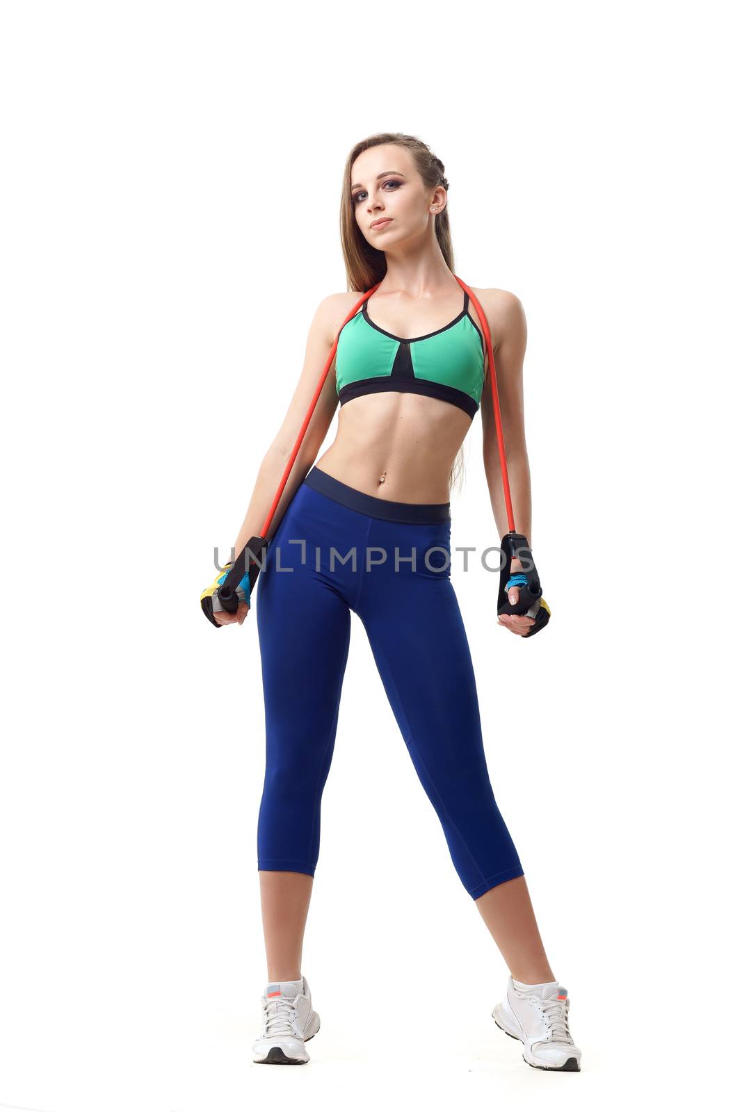 Concepts: healthy lifestyle, sport. Happy beautiful woman fitness trainer working out with fit tube isolated on white background