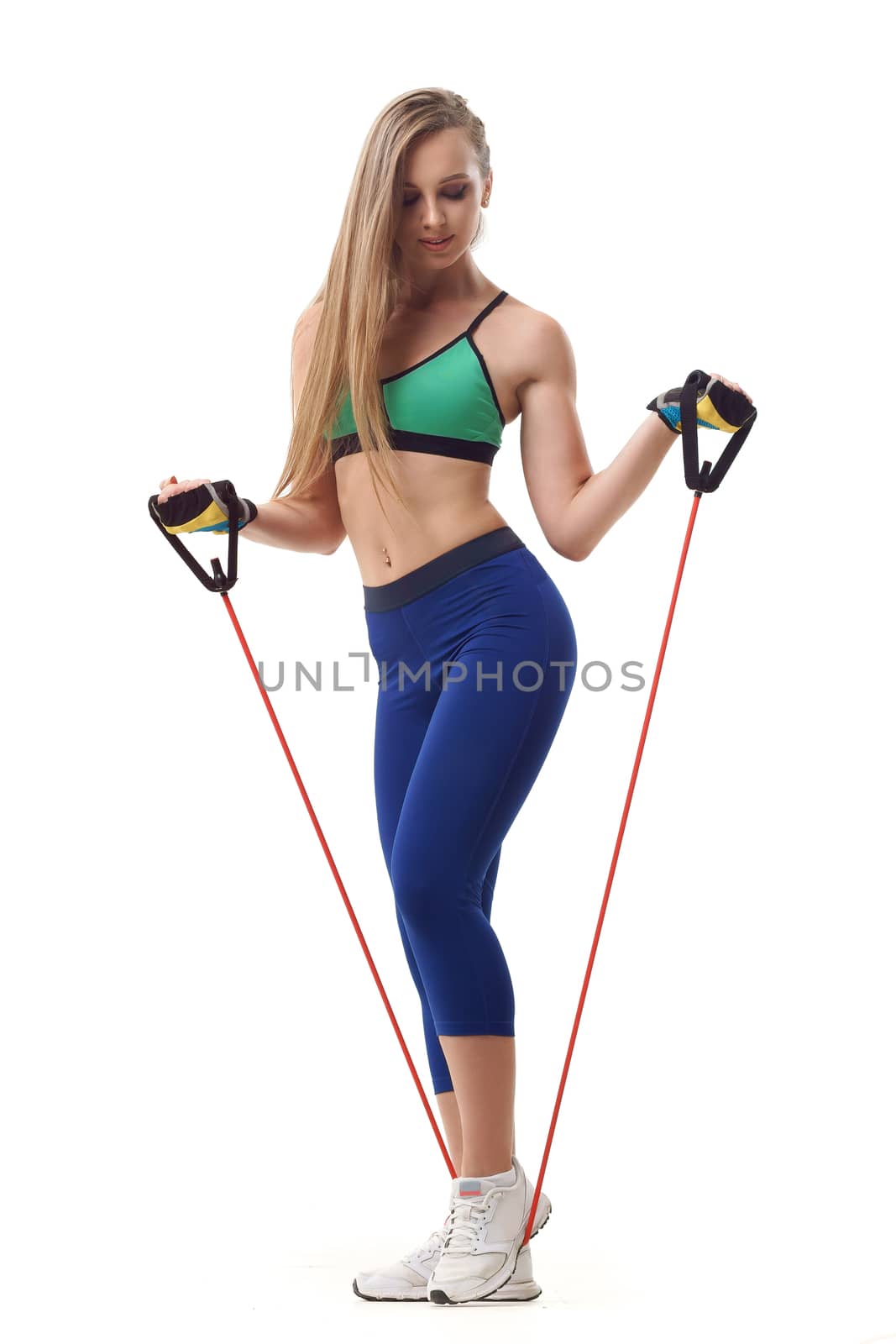 woman trainer working out with fit tube isolated on white by mrakor