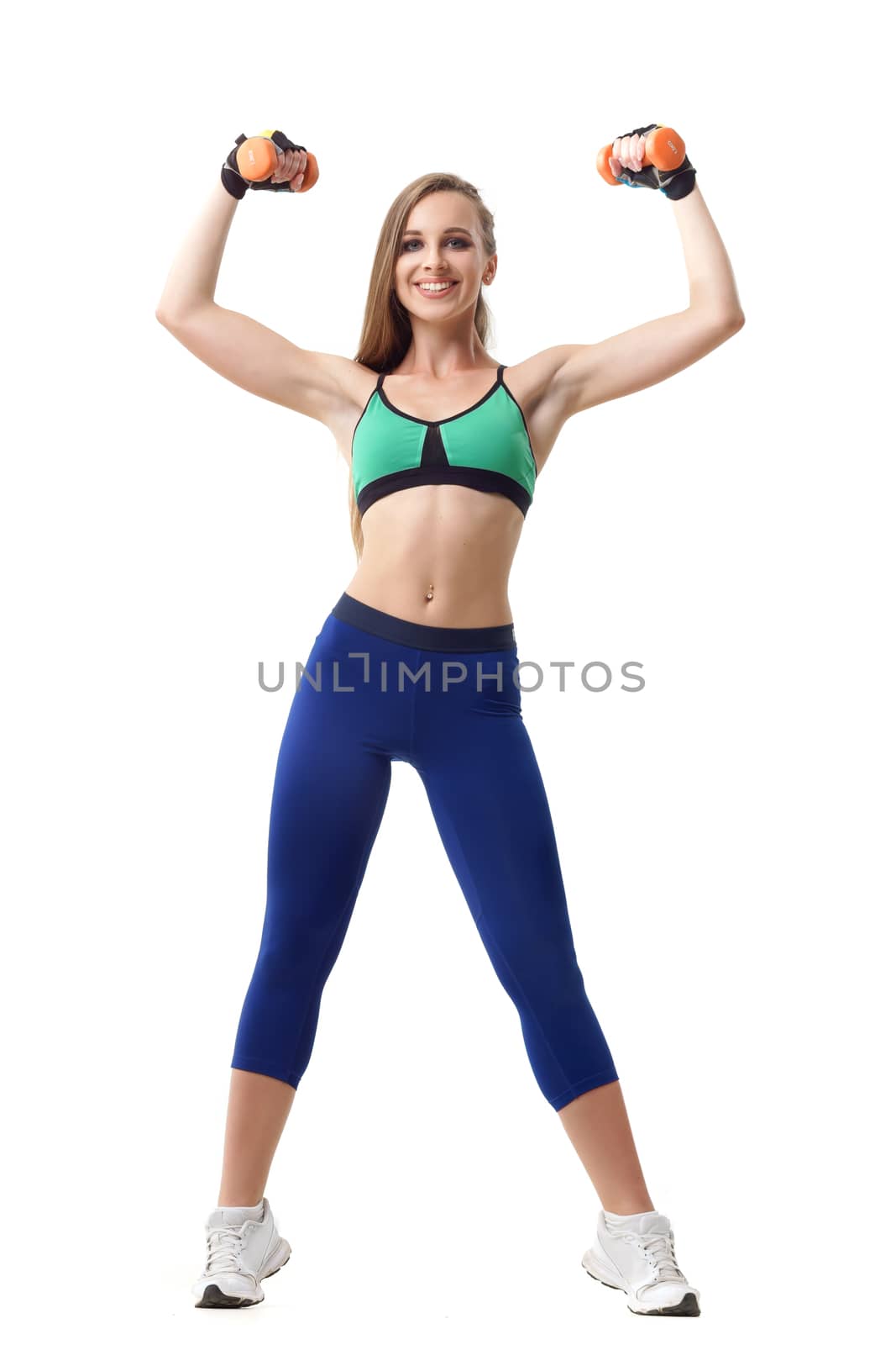 Concepts: healthy lifestyle, sport. Happy beautiful woman fitness trainer working out with small dumbbells isolated on white background