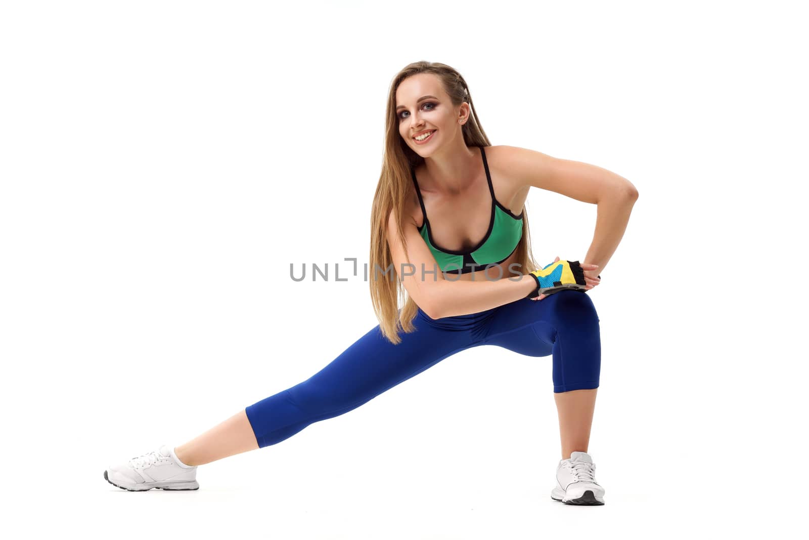 Beautiful woman fitness trainer working out isolated on white background by mrakor