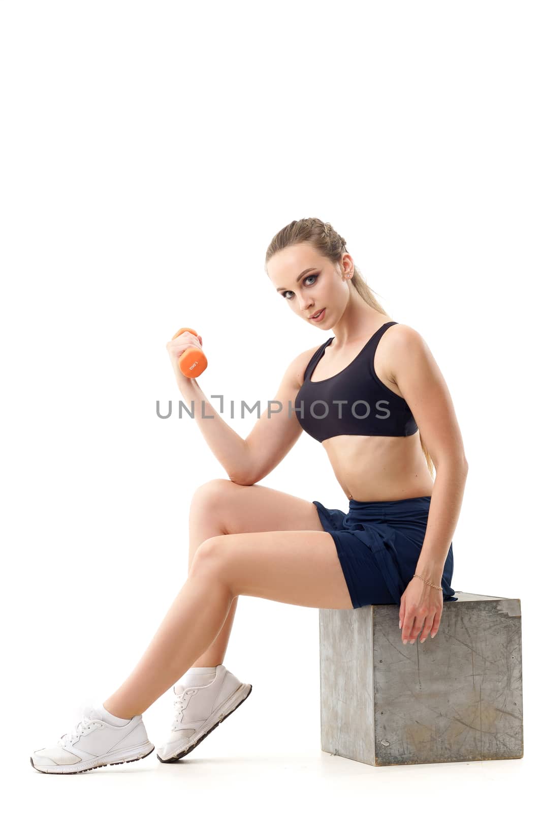 Concepts: healthy lifestyle, sport. Happy beautiful woman fitness trainer working out with small dumbbells isolated on white background