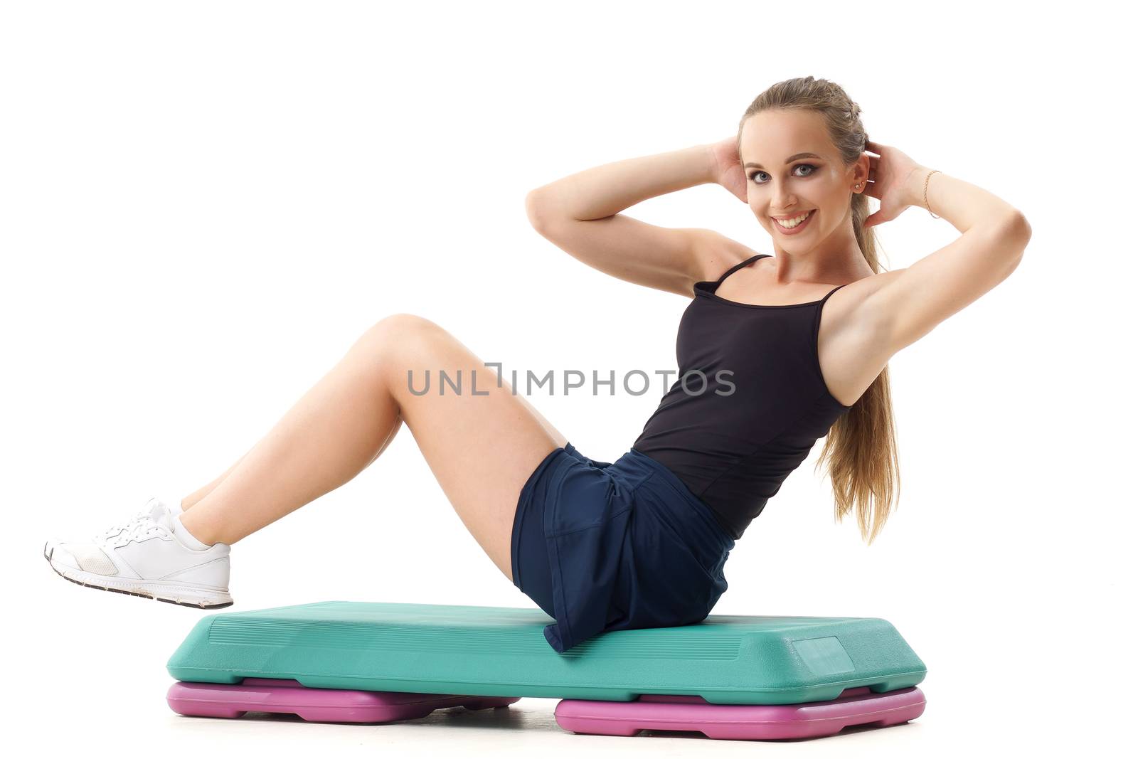 Concepts: healthy lifestyle, sport. Happy beautiful woman fitness trainer working out step aerobics isolated on white background
