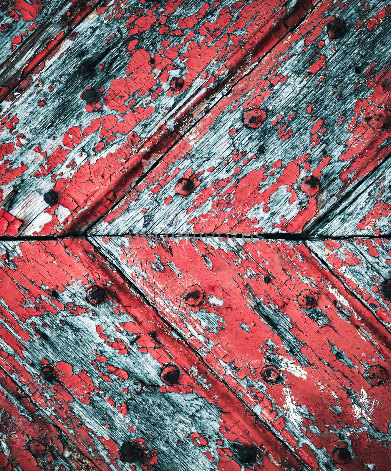 abstract background or texture peeled red paint on old wooden gate