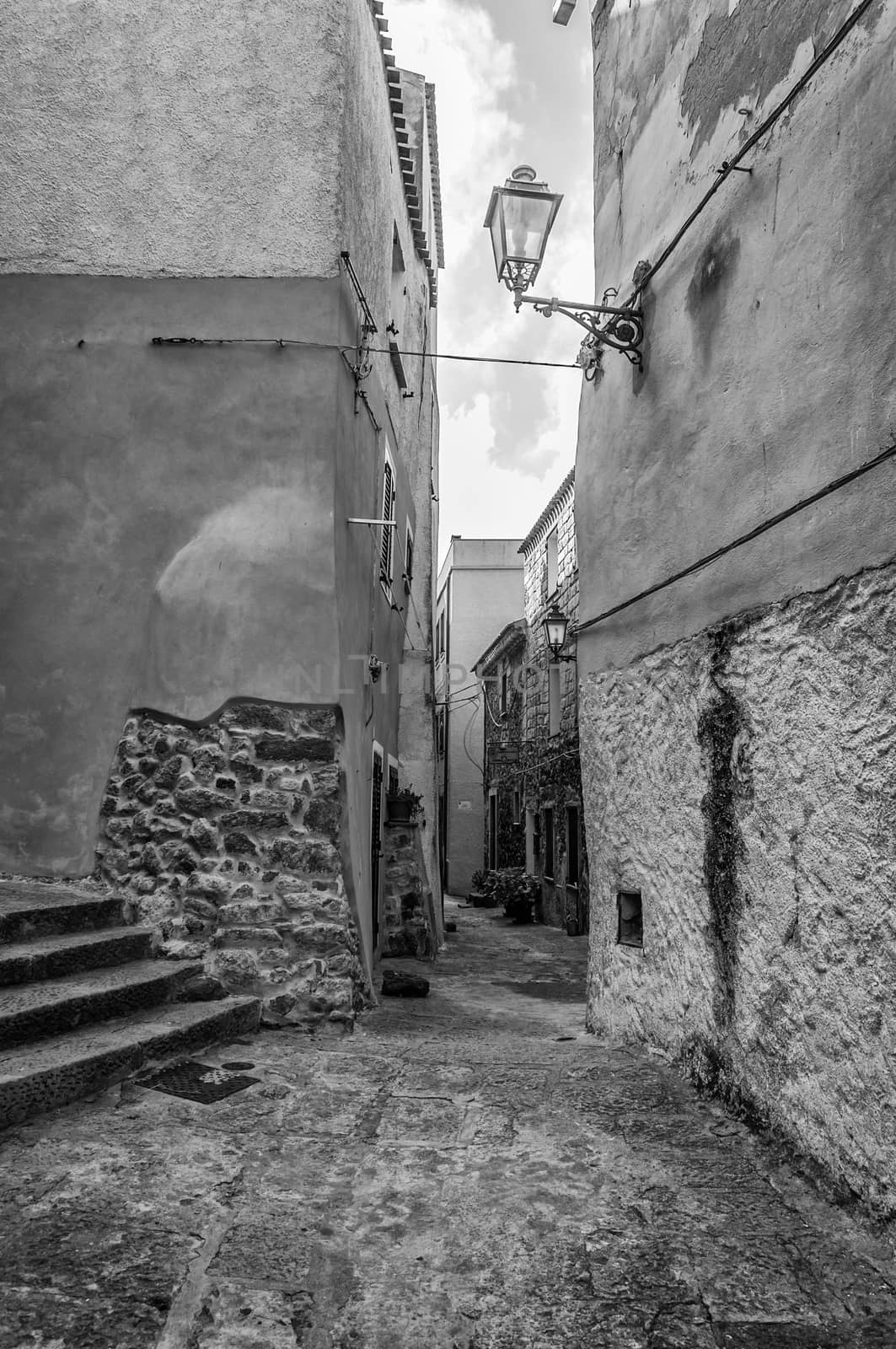 the beautiful alley of castelsardo old city - sardinia - italy