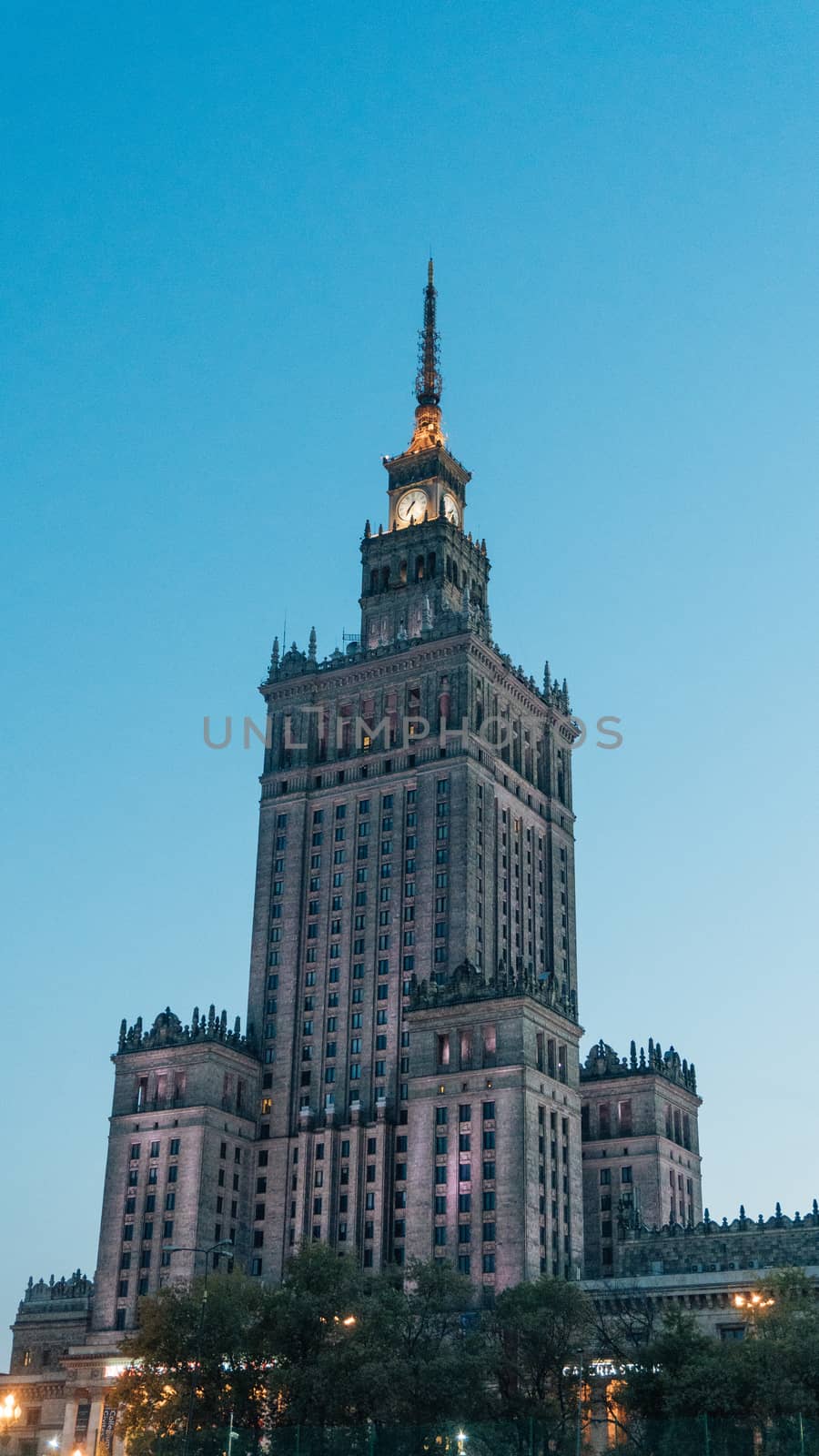 Warsaw, Poland. City center with Palace of Culture and Science, a landmark and symbol of Stalinism and communism, and modern sky scrapers.