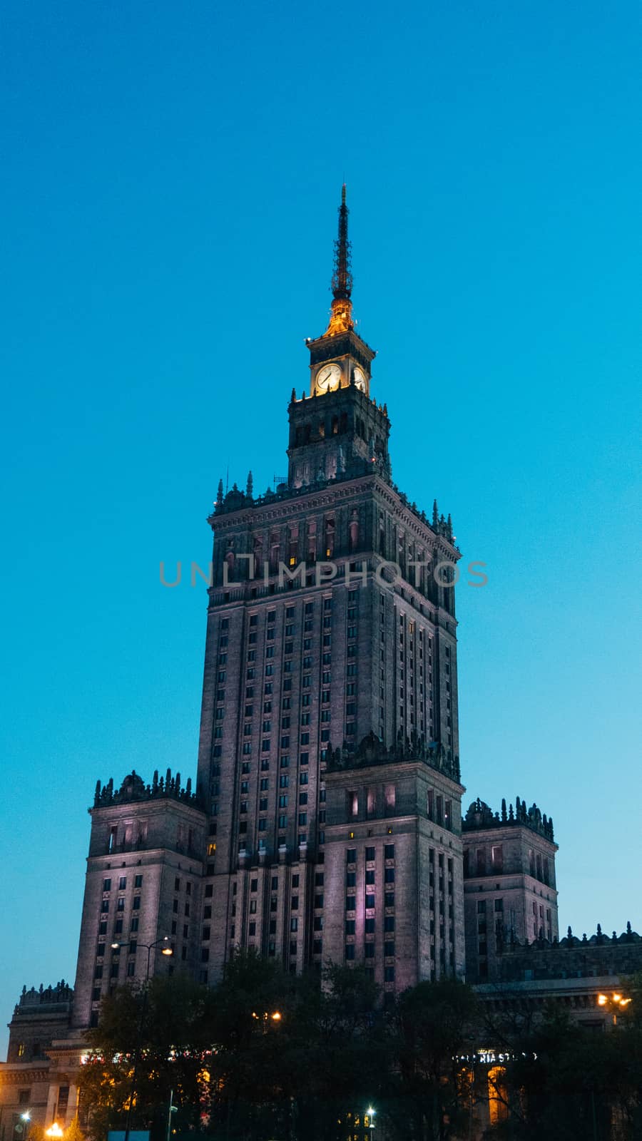 Warsaw, Poland. City center with Palace of Culture and Science, a landmark and symbol of Stalinism and communism, and modern sky scrapers.