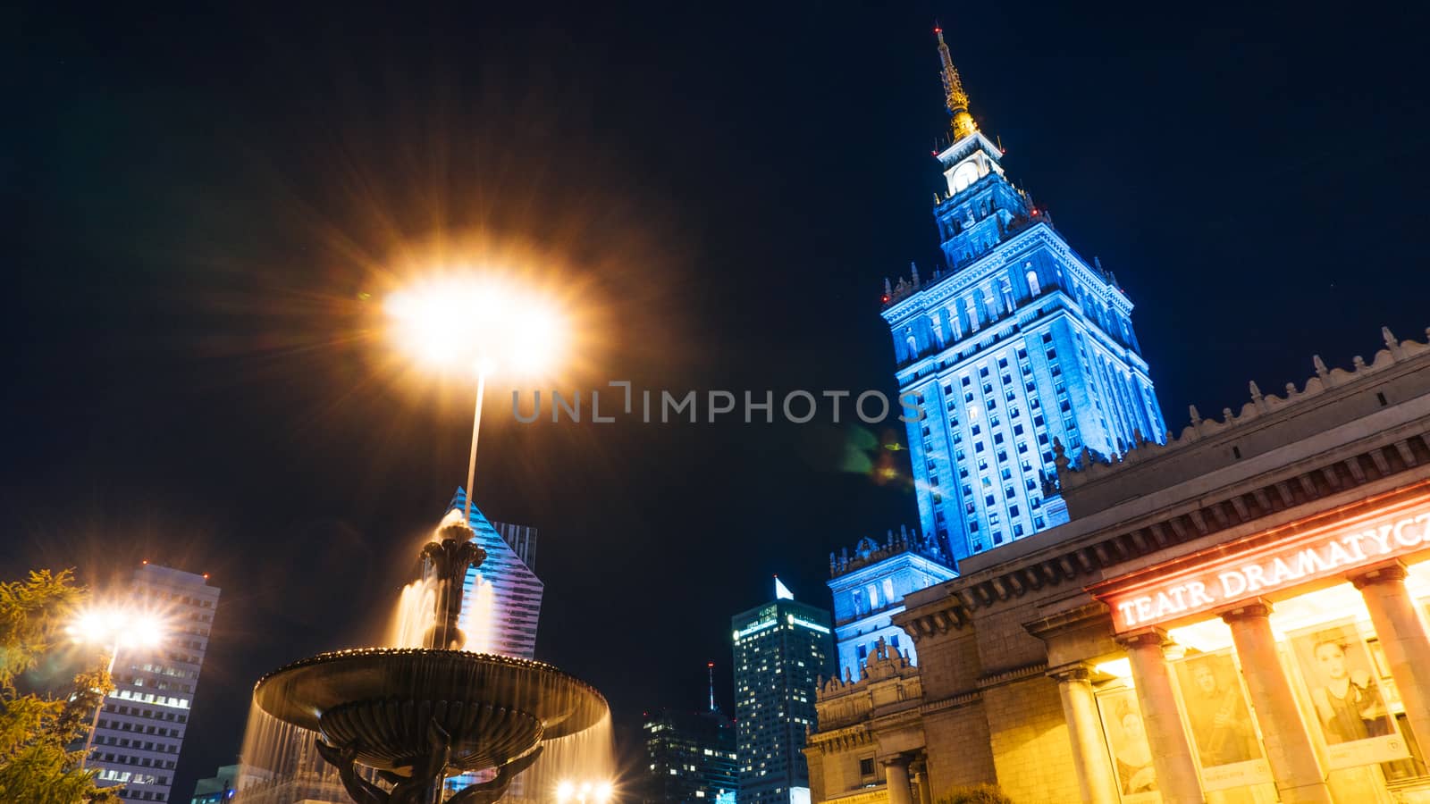 Warsaw, Poland. City center with Palace of Culture and Science, a landmark and symbol of Stalinism and communism, and modern sky scrapers.