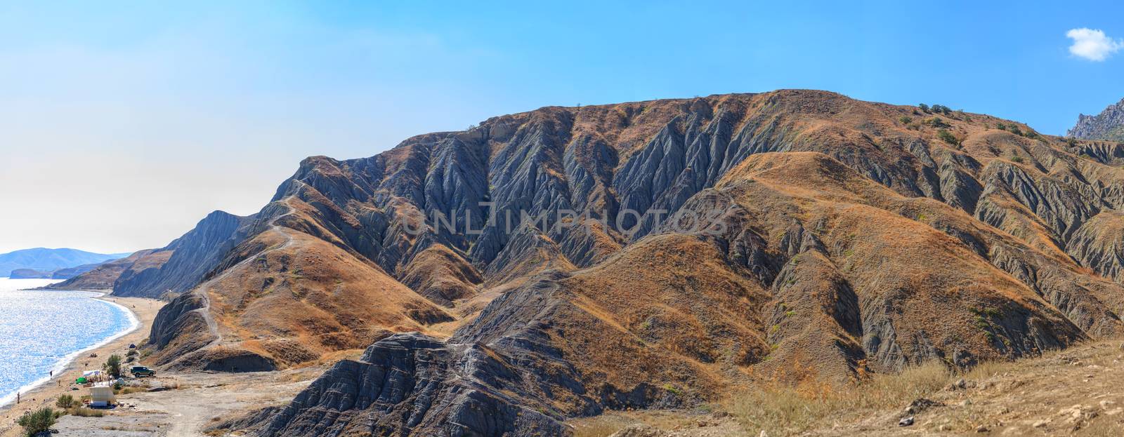 Wild beach in Crimea near the mountain range