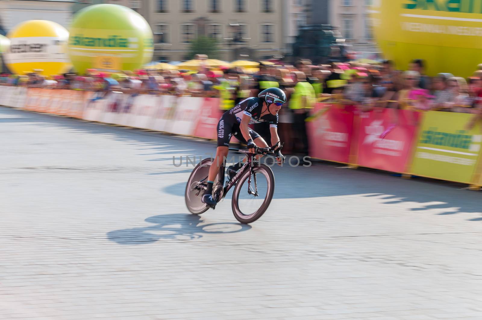 KRAKOW, POLAND - AUGUST 9: Cyclist at the final stage of 71th Tour de Pologne on August 9, 2014 in Krakow. Tour de Pologne is the biggest cycling event in Eastern Europe.