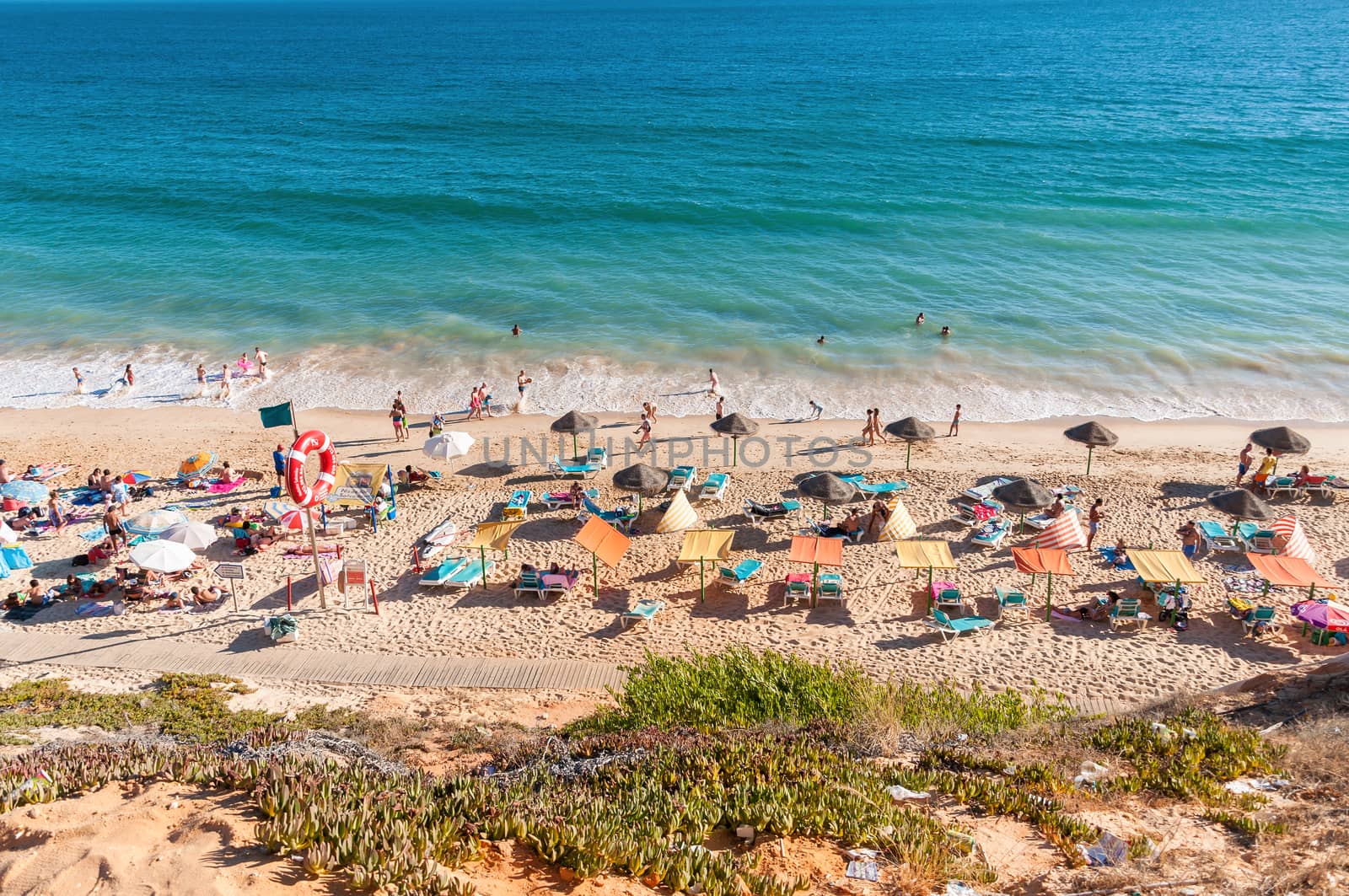 Crowded Falesia Beach seen from the cliff by mkos83