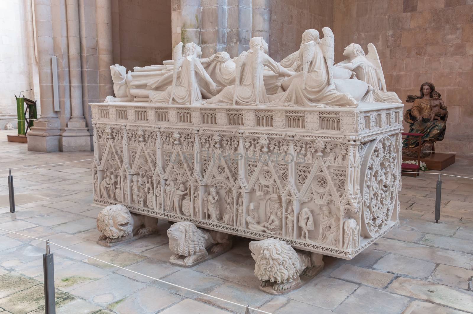 ALCOBACA, PORTUGAL - AUGUST 24, 2014: Ornate tomb of King Pedro I in Alcobaca Monastery. Pedro I was King of Portugal and the Algarve in the years 1357 - 1367.