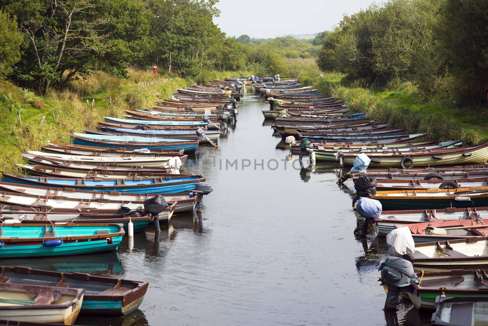 rowing boats moored at ross castle in killarney county kerry ireland