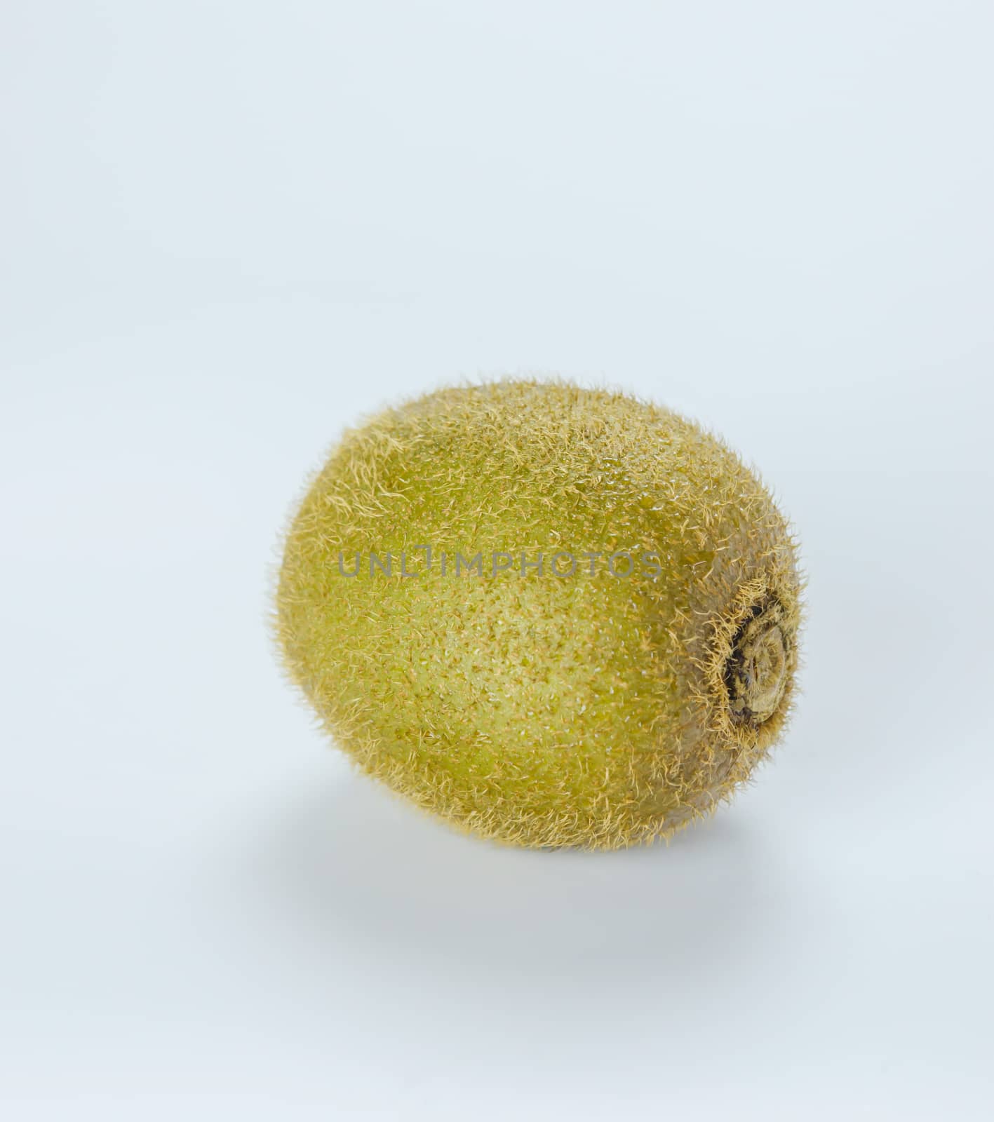 delicious whole kiwi fruit on white background