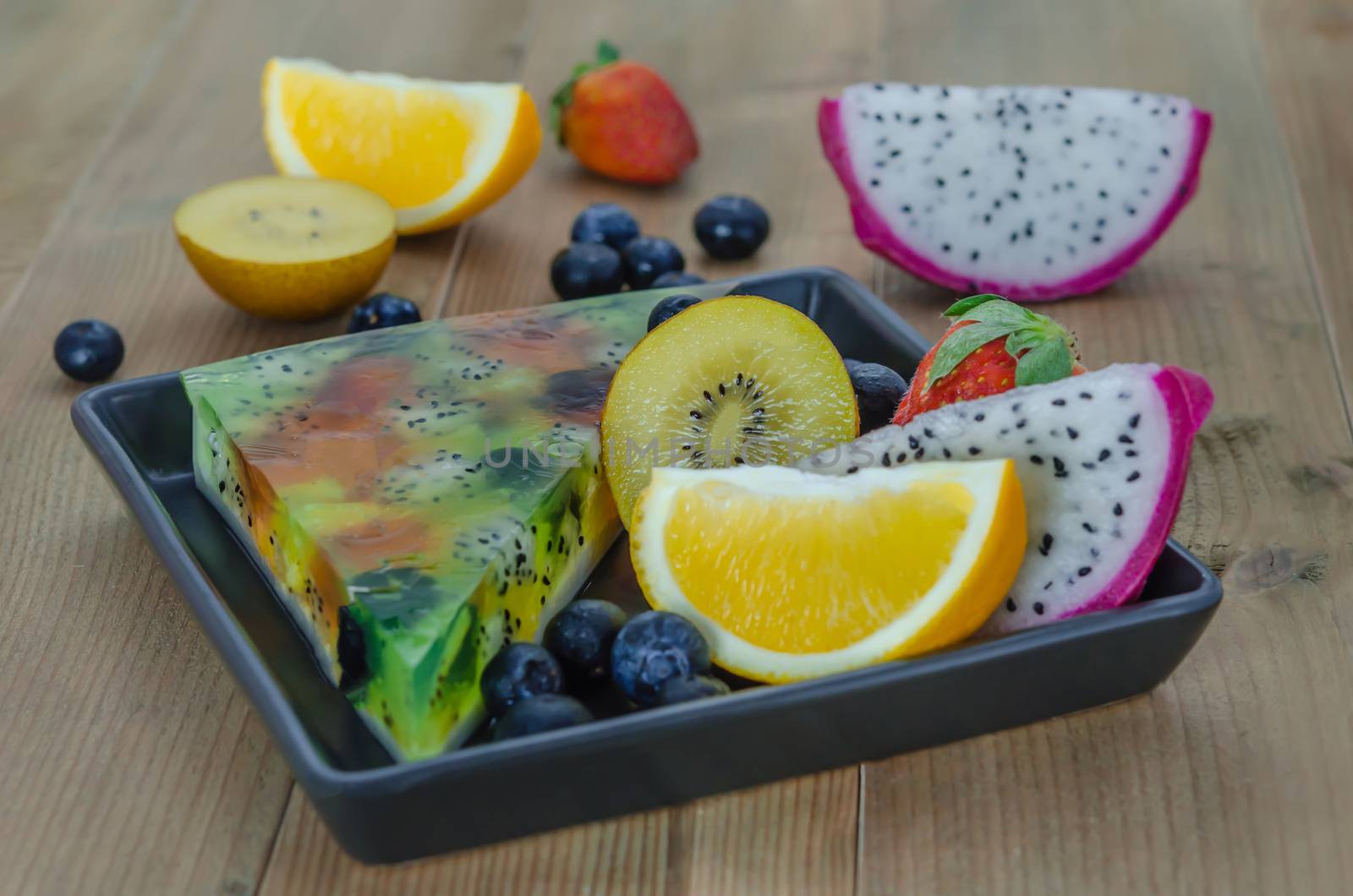 Mixed jelly fruits ( strawberry, blueberry, kiwi, orange, dragon fruit )