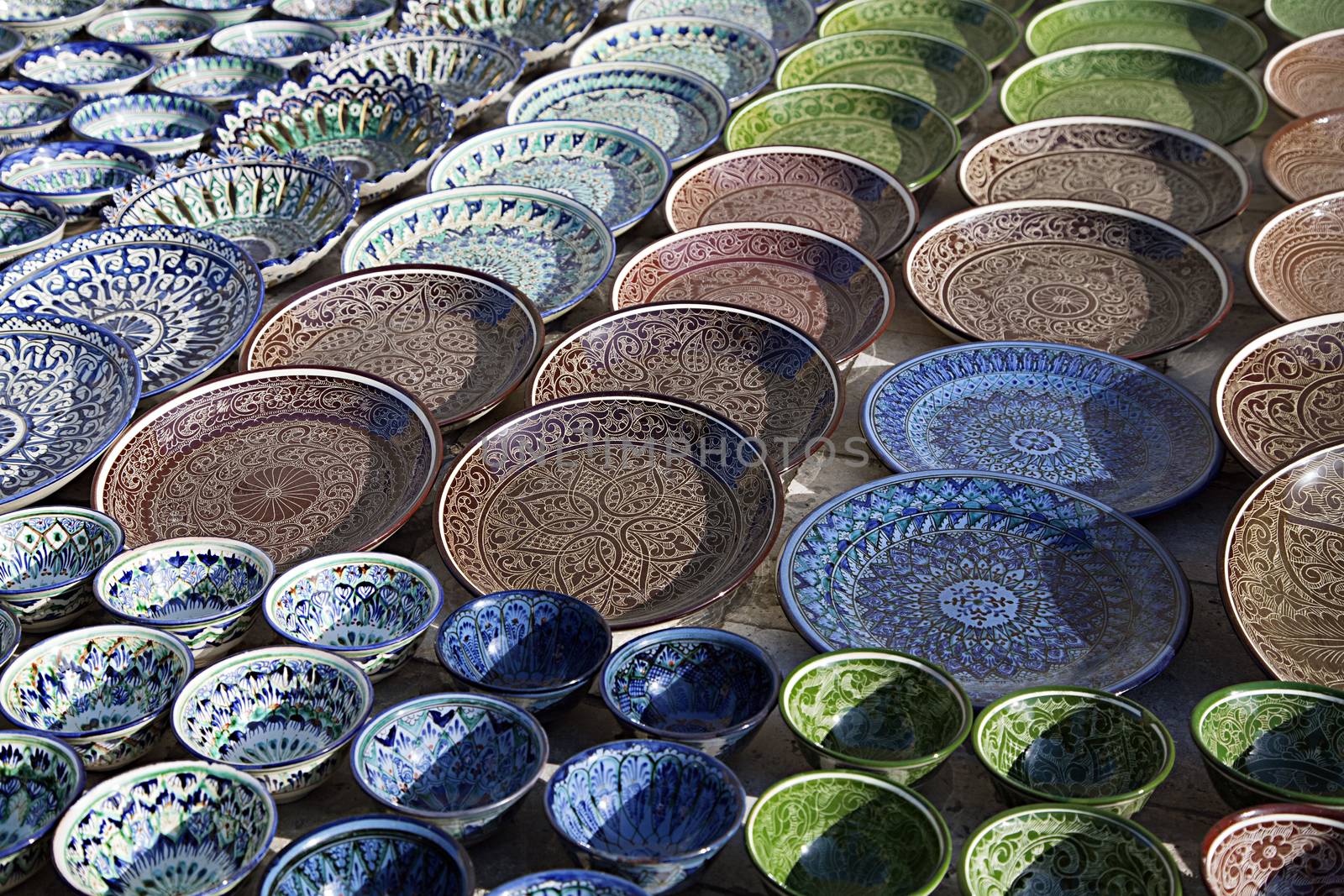 Traditional ceramic dishware in a street market, Uzbekistan