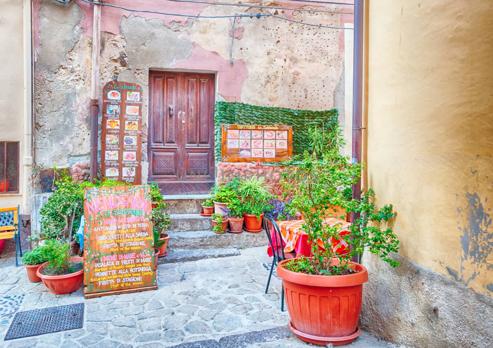 the beautiful alley of castelsardo old city - sardinia - italy