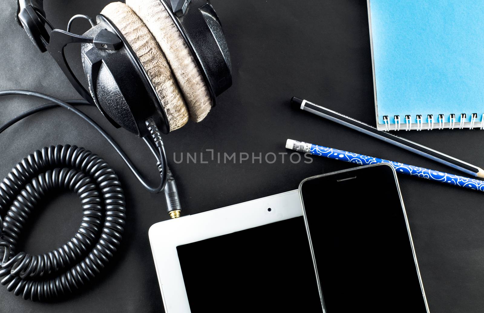 blank notebook in top view with music concept 
Black background  by metal22