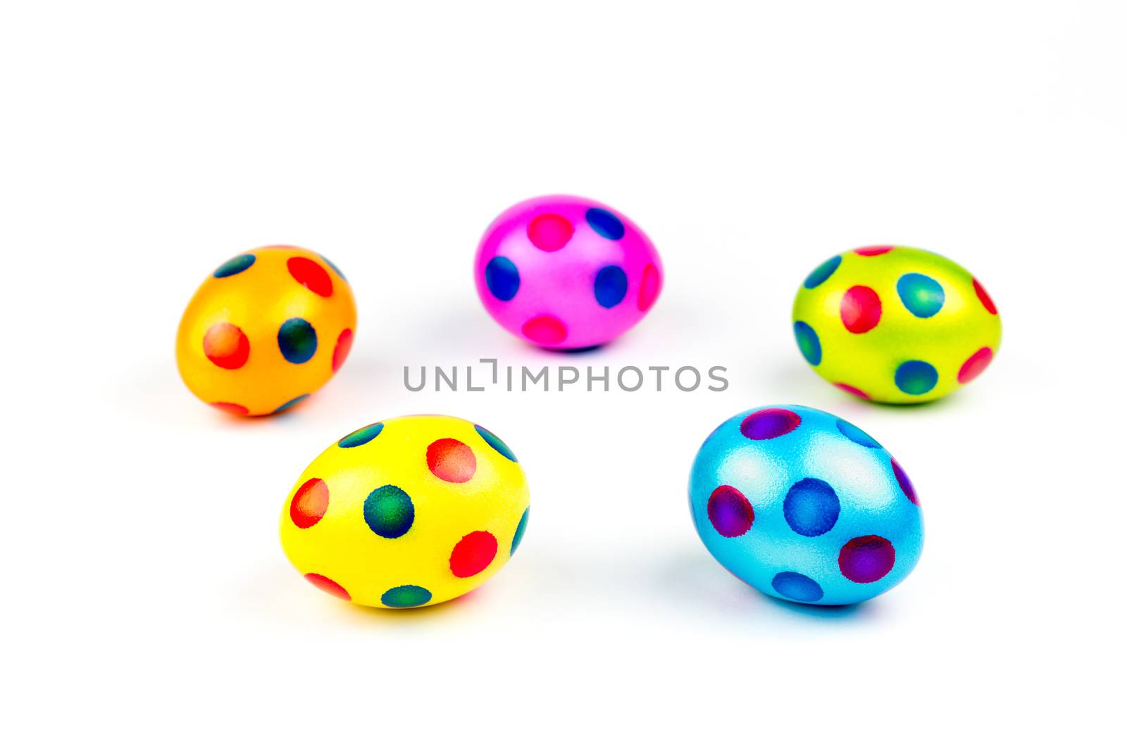 Colourful painted lying chicken easter eggs isolated on white background