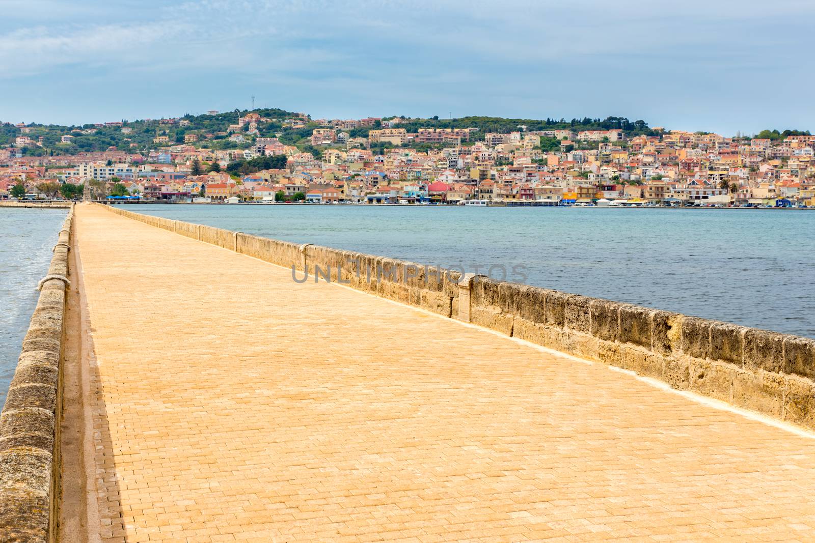 Greek City Port Argostoli with road on bridge by BenSchonewille