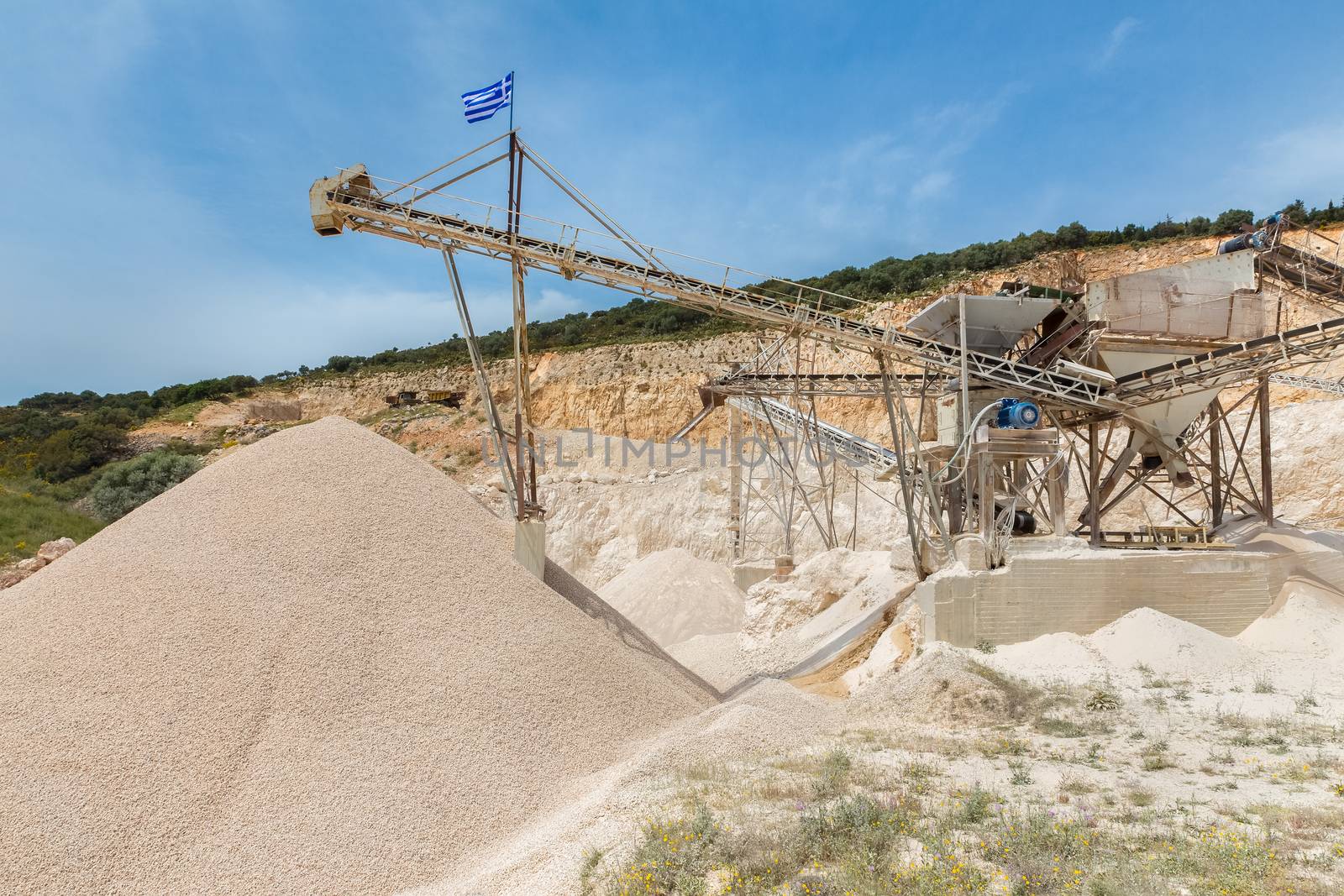 Machine in Greece mining gravel as commodity