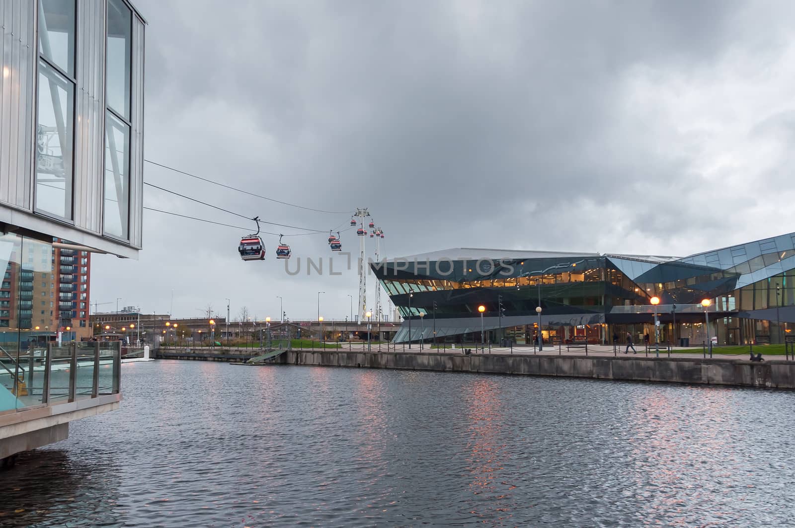 London, United Kingdom - November 8, 2014: Royal Victoria Docks cable car station on a rainy day. Emirates Air Line is a ten minute gondola lift link across the River Thames.