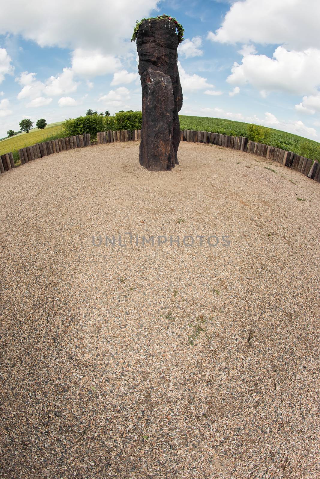 Menhir Stone Shepherd  is a menhir standing alone in a field 1 km northwest of the village Klobuky, district Kladno. This is the highest menhir in the Czech Republic.  3.5 m tall columnar rock uncut dark iron Cretaceous sandstone. This is one of the few stones in the country, which we can with high probability be considered a real prehistoric menhir.