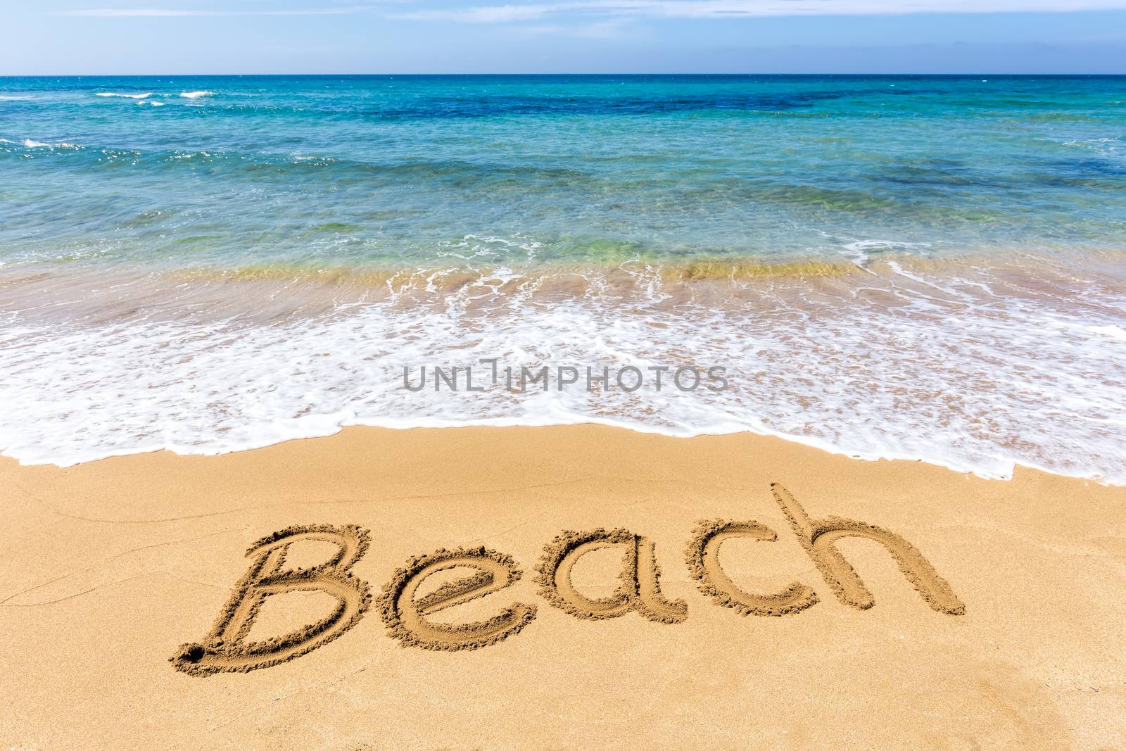 Word Beach written in sand at greek sea by BenSchonewille