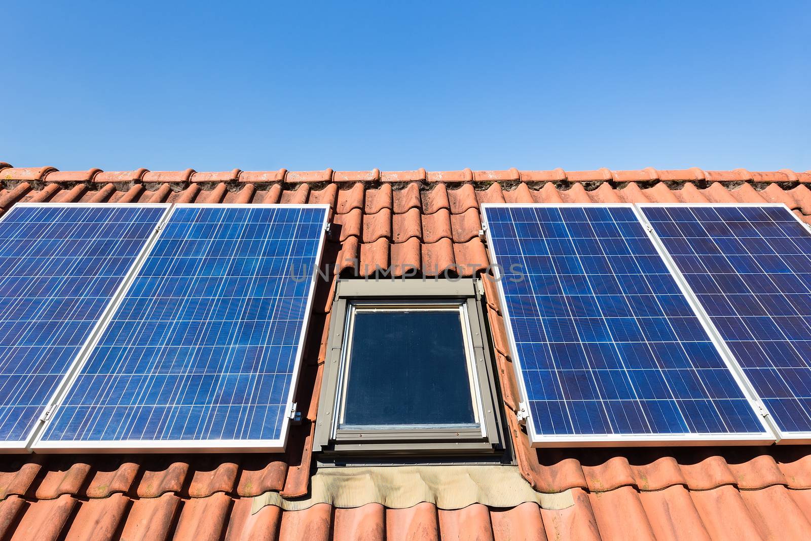 Blue solar collectors and attic window by BenSchonewille