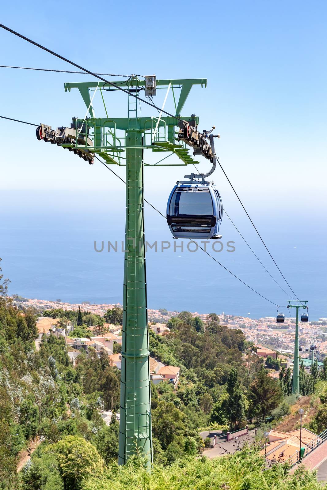 Cable car with cabins in landscape of Madeira by BenSchonewille